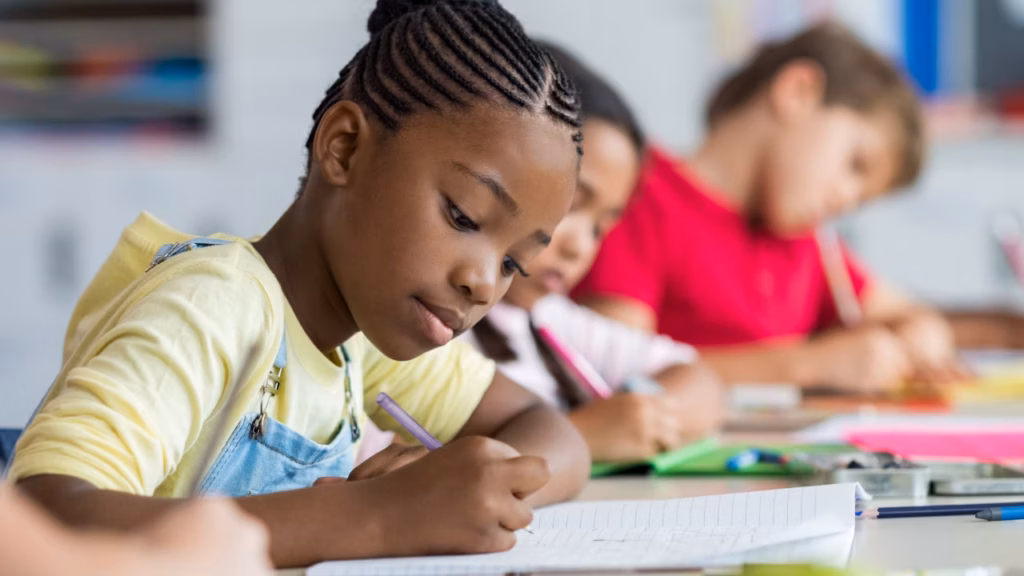 Students in a row, working in class
