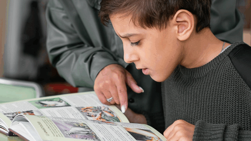 Boy learning to read