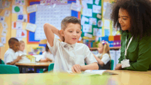 kid in school with teacher