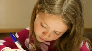 young girl being screened for reading risk